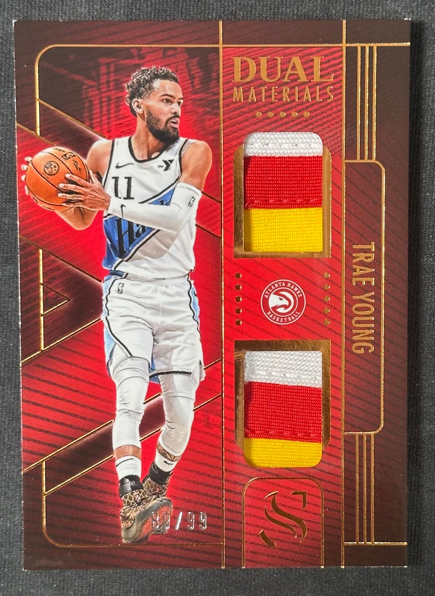 2024-25 Panini Silhouette Trae Young Game Used Dual Patch Bronze #/99